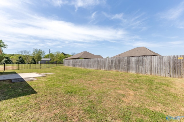 view of yard featuring a fenced backyard