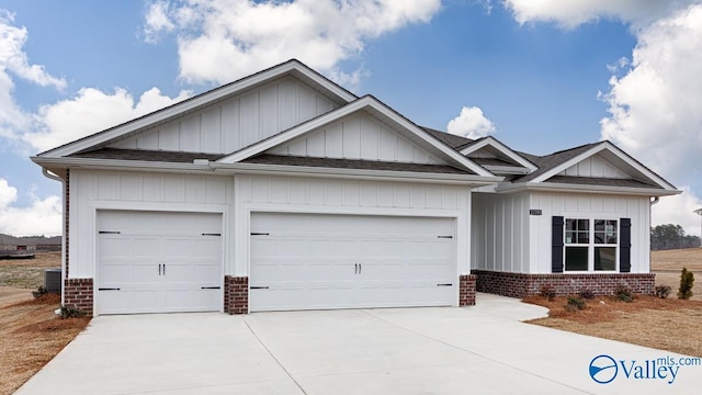22289 Westminster Dr, Athens, AL 35613 - view of front facade featuring brick siding, a garage, concrete driveway, board and batten siding, and a shingled roof