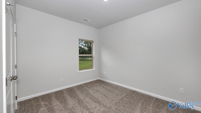 spare room with carpet flooring