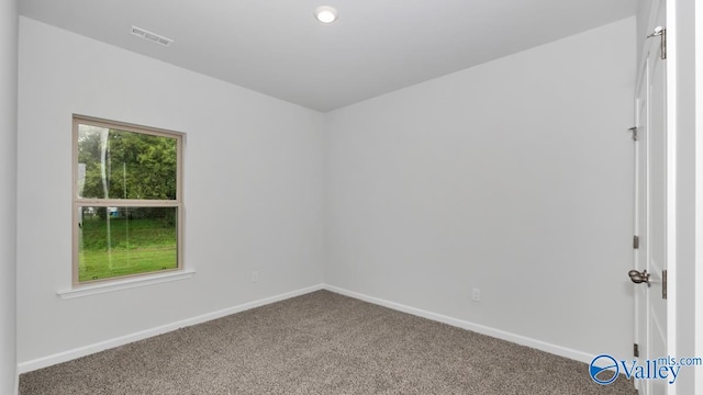 view of carpeted spare room