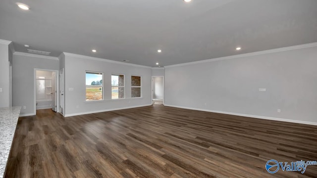22289 Westminster Dr, Athens, AL 35613 - unfurnished living room with recessed lighting, baseboards, dark wood finished floors, and ornamental molding