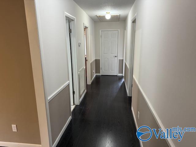 2500 Montezuma Dr, Gadsden, AL 35904 - hall featuring baseboards and dark wood finished floors
