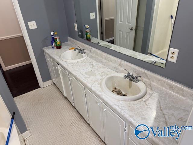2500 Montezuma Dr, Gadsden, AL 35904 - bathroom with tile patterned flooring, a sink, baseboards, and double vanity