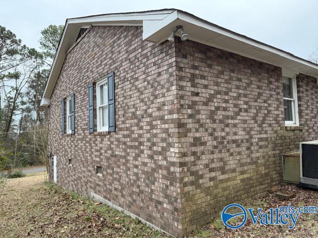 2500 Montezuma Dr, Gadsden, AL 35904 - view of home's exterior featuring crawl space and brick siding