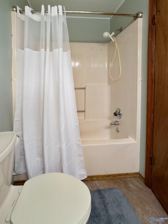 bathroom featuring toilet and shower / bathtub combination with curtain