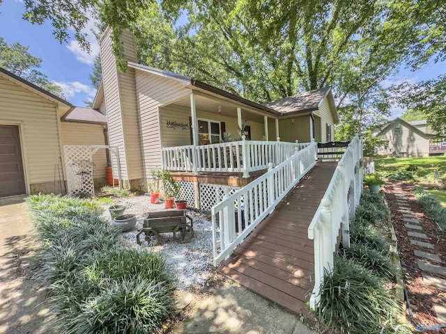 wooden terrace with a porch