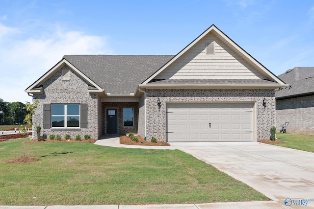 craftsman inspired home with a front yard and a garage