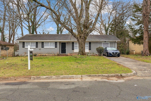 2217 Linde St, Huntsville, AL 35810 - ranch-style house with a front yard, brick siding, and concrete driveway