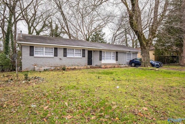 2217 Linde St, Huntsville, AL 35810 - ranch-style house with brick siding and a front lawn
