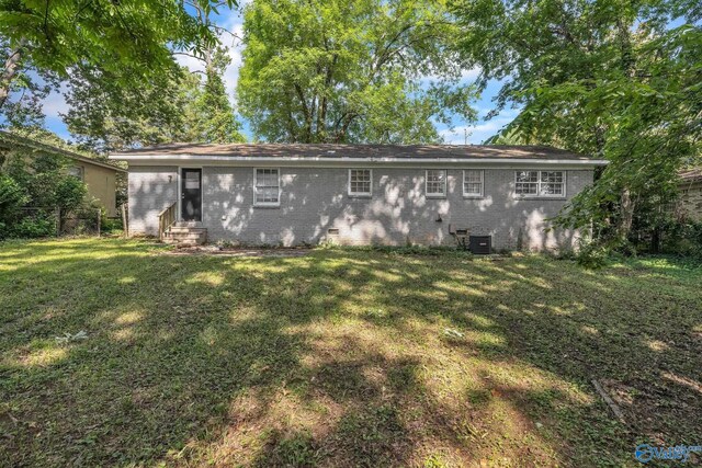 2217 Linde St, Huntsville, AL 35810 - rear view of property featuring entry steps, brick siding, and crawl space