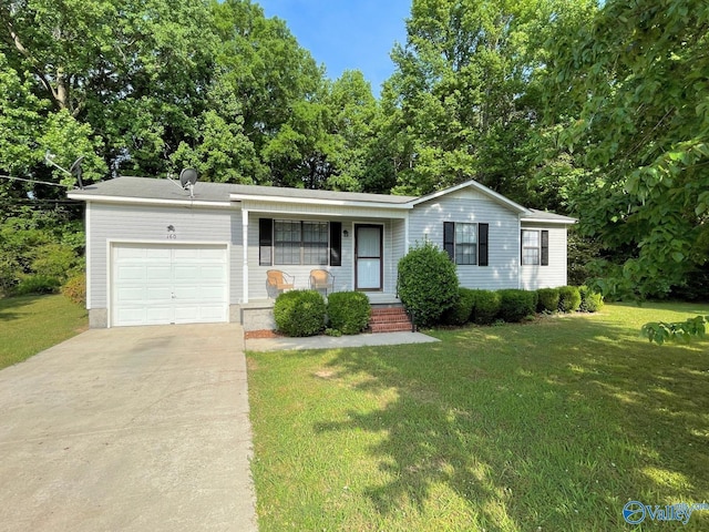 160 Guy Wilson Rd, Hazel Green, AL 35750 - single story home featuring a garage, a porch, driveway, and a front lawn