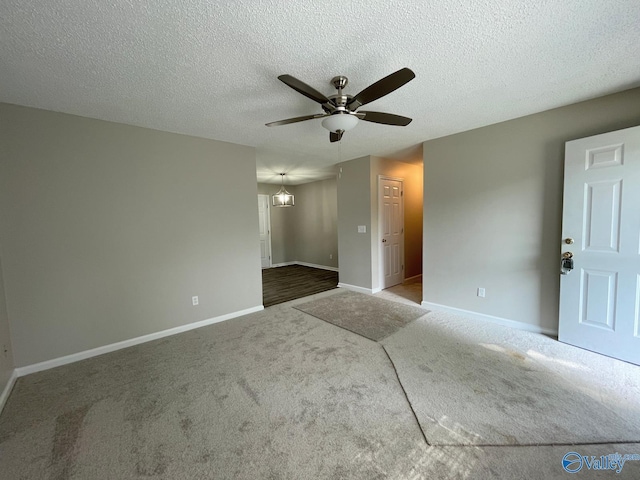 160 Guy Wilson Rd, Hazel Green, AL 35750 - carpeted empty room with baseboards, a textured ceiling, and ceiling fan