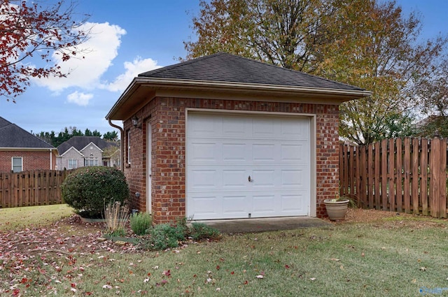 garage with a lawn