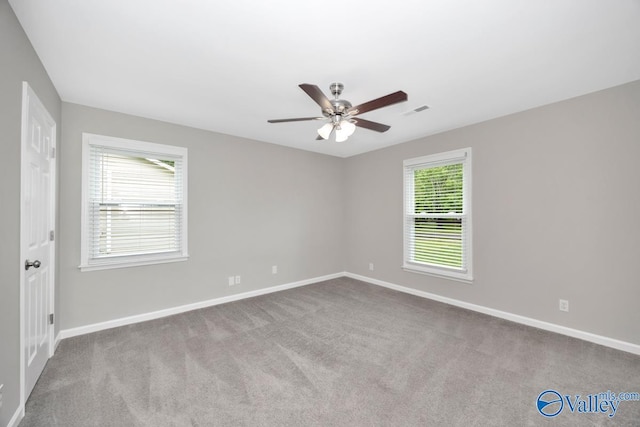 1503 Cedarwood Cir, Huntsville, AL 35803 - carpeted spare room featuring baseboards and ceiling fan
