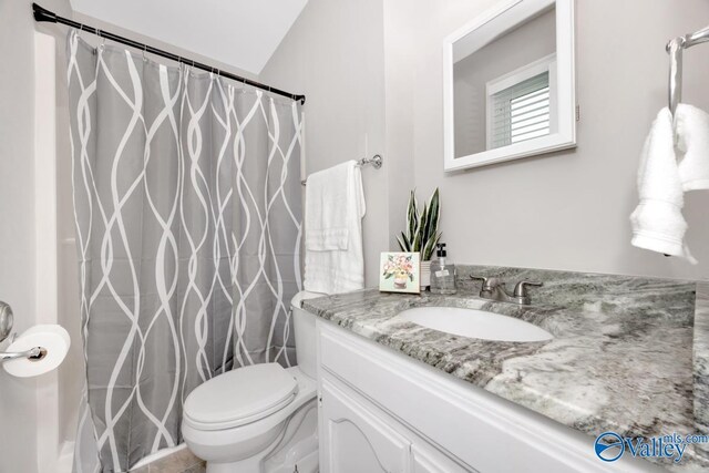 1503 Cedarwood Cir, Huntsville, AL 35803 - bathroom with vanity, toilet, and a shower with shower curtain