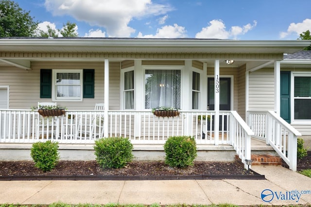 1503 Cedarwood Cir, Huntsville, AL 35803 - entrance to property with a porch