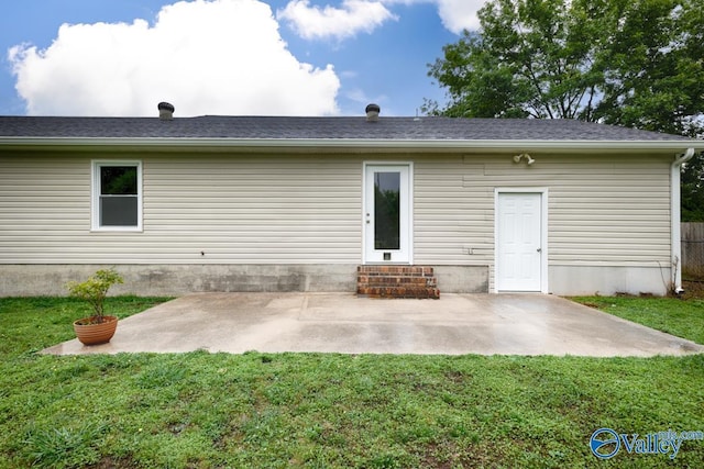1503 Cedarwood Cir, Huntsville, AL 35803 - rear view of property with entry steps, a yard, and a patio