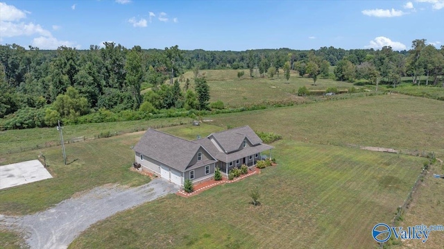 birds eye view of property with a rural view and a forest view