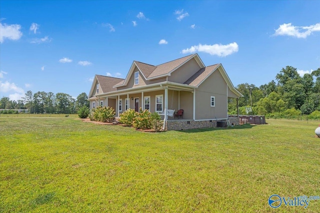 view of side of property with a lawn