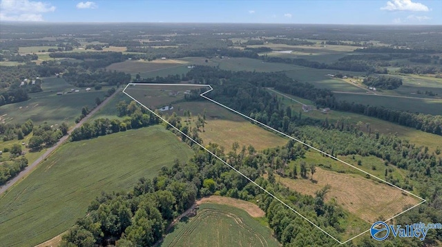 birds eye view of property featuring a rural view