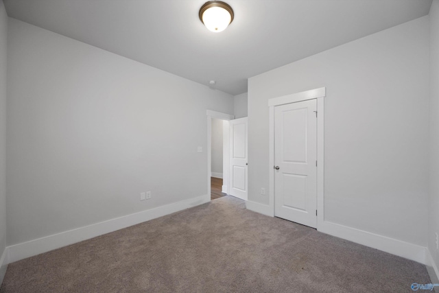 empty room featuring carpet floors