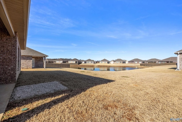 view of yard with a water view