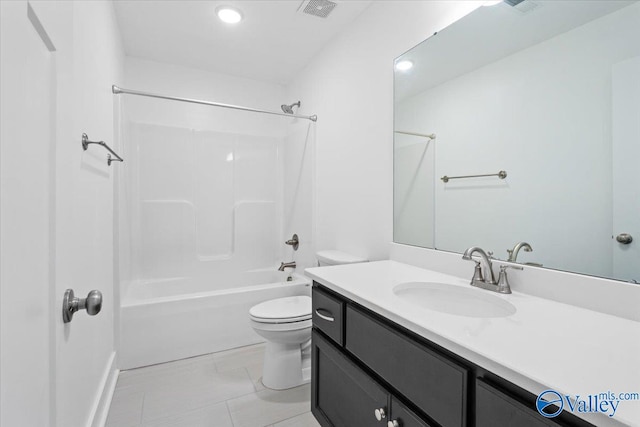 full bathroom featuring bathing tub / shower combination, tile patterned flooring, vanity, and toilet