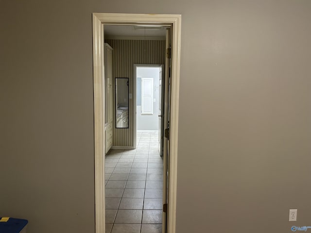 corridor featuring light tile patterned flooring