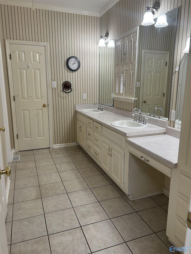 bathroom featuring ornamental molding, tile patterned floors, and vanity