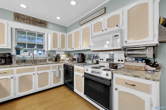 kitchen with electric stove, light wood-type flooring, dishwasher, white cabinets, and light stone counters