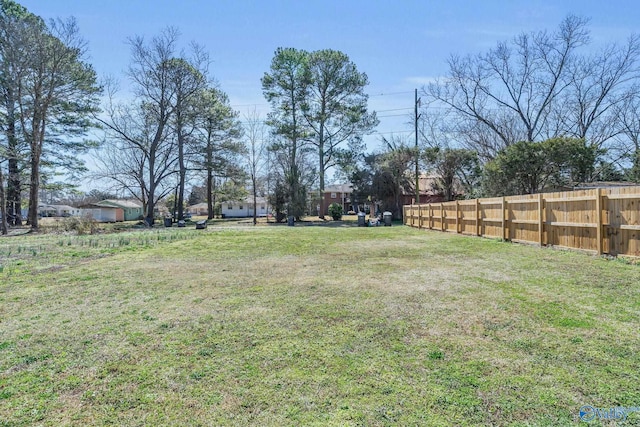 view of yard with fence