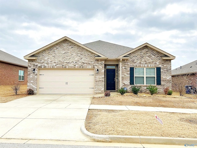 single story home with concrete driveway, brick siding, a garage, and a shingled roof