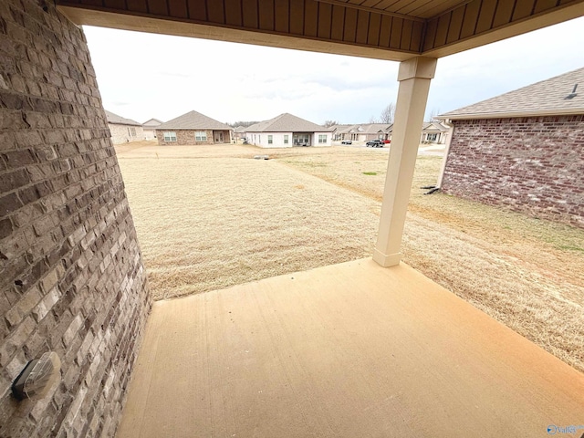 view of patio featuring a residential view