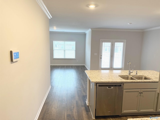 kitchen featuring a sink, open floor plan, dishwasher, and ornamental molding