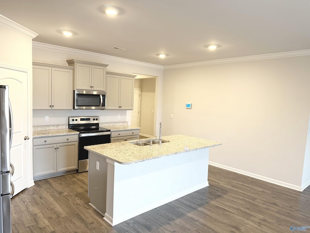 kitchen with dark wood-type flooring, ornamental molding, appliances with stainless steel finishes, and a sink