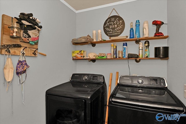 washroom with ornamental molding and washer and dryer