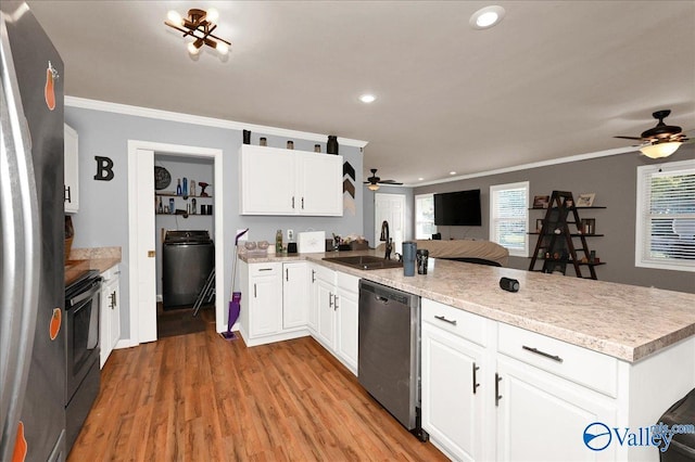 kitchen featuring white cabinetry, appliances with stainless steel finishes, sink, and crown molding