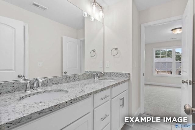 bathroom featuring vanity and tile patterned floors