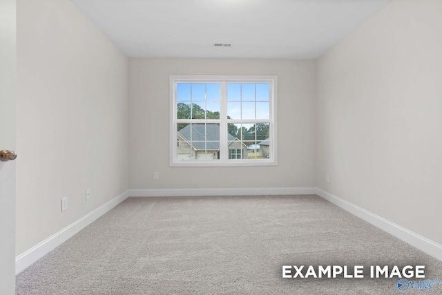 empty room featuring carpet