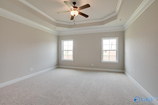 108 Ivy Vine Dr, Toney, AL 35773 - empty room with a tray ceiling, light carpet, crown molding, a ceiling fan, and baseboards