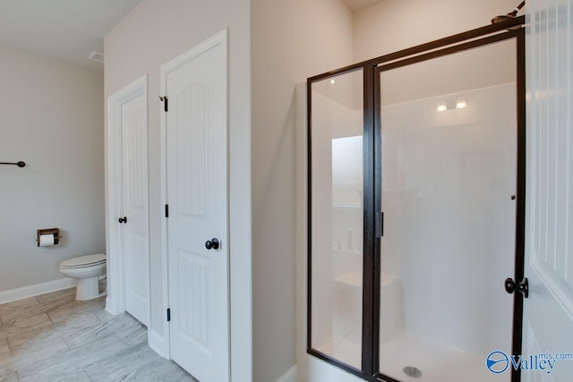 108 Ivy Vine Dr, Toney, AL 35773 - full bathroom featuring a stall shower, toilet, and baseboards