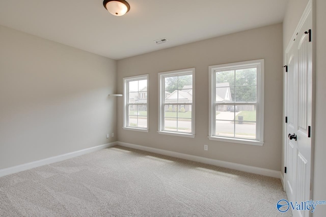 108 Ivy Vine Dr, Toney, AL 35773 - unfurnished room featuring baseboards and light colored carpet