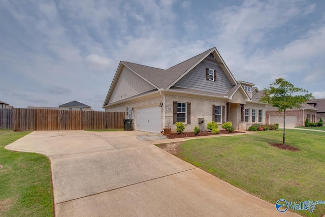 108 Ivy Vine Dr, Toney, AL 35773 - craftsman house with brick siding, driveway, and a garage
