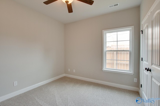 108 Ivy Vine Dr, Toney, AL 35773 - carpeted spare room with ceiling fan and baseboards
