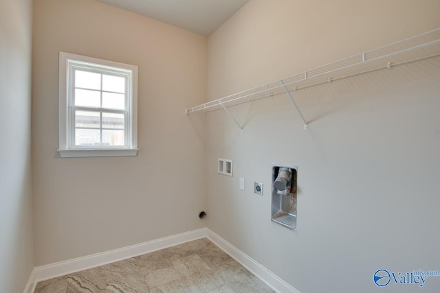 108 Ivy Vine Dr, Toney, AL 35773 - laundry room featuring baseboards, washer hookup, and hookup for an electric dryer