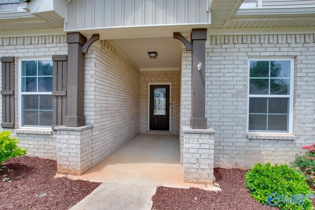108 Ivy Vine Dr, Toney, AL 35773 - entrance to property with board and batten siding and brick siding
