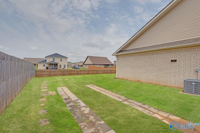 108 Ivy Vine Dr, Toney, AL 35773 - view of yard featuring central air condition unit