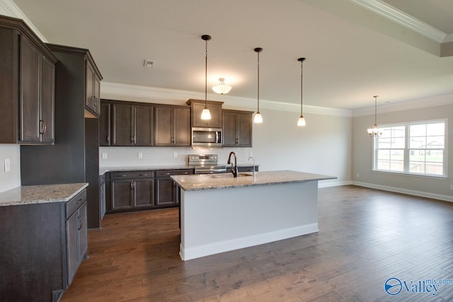 108 Ivy Vine Dr, Toney, AL 35773 - kitchen with appliances with stainless steel finishes, decorative backsplash, light stone countertops, dark wood-style flooring, and ornamental molding
