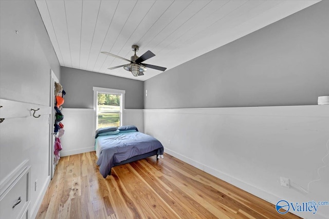 bedroom featuring ceiling fan, wooden ceiling, and light hardwood / wood-style flooring