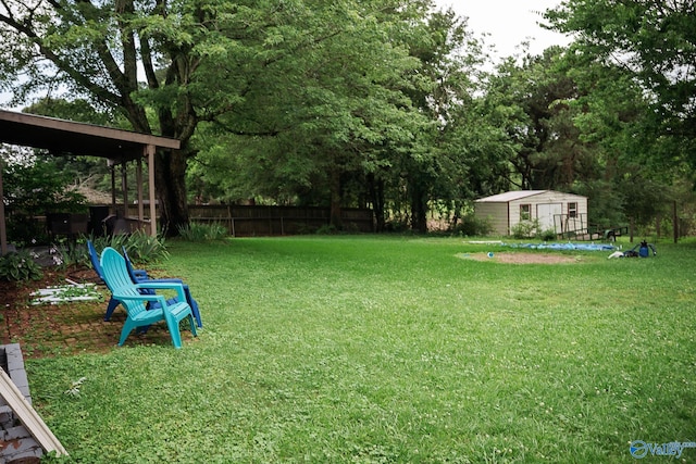 1021 NW 9th St NW, Arab, AL 35016 - view of yard featuring a storage unit